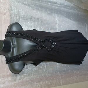 International moda black top with beaded v-neck